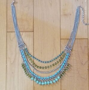 Multi tiered boho beaded chain link necklace with beaded detail